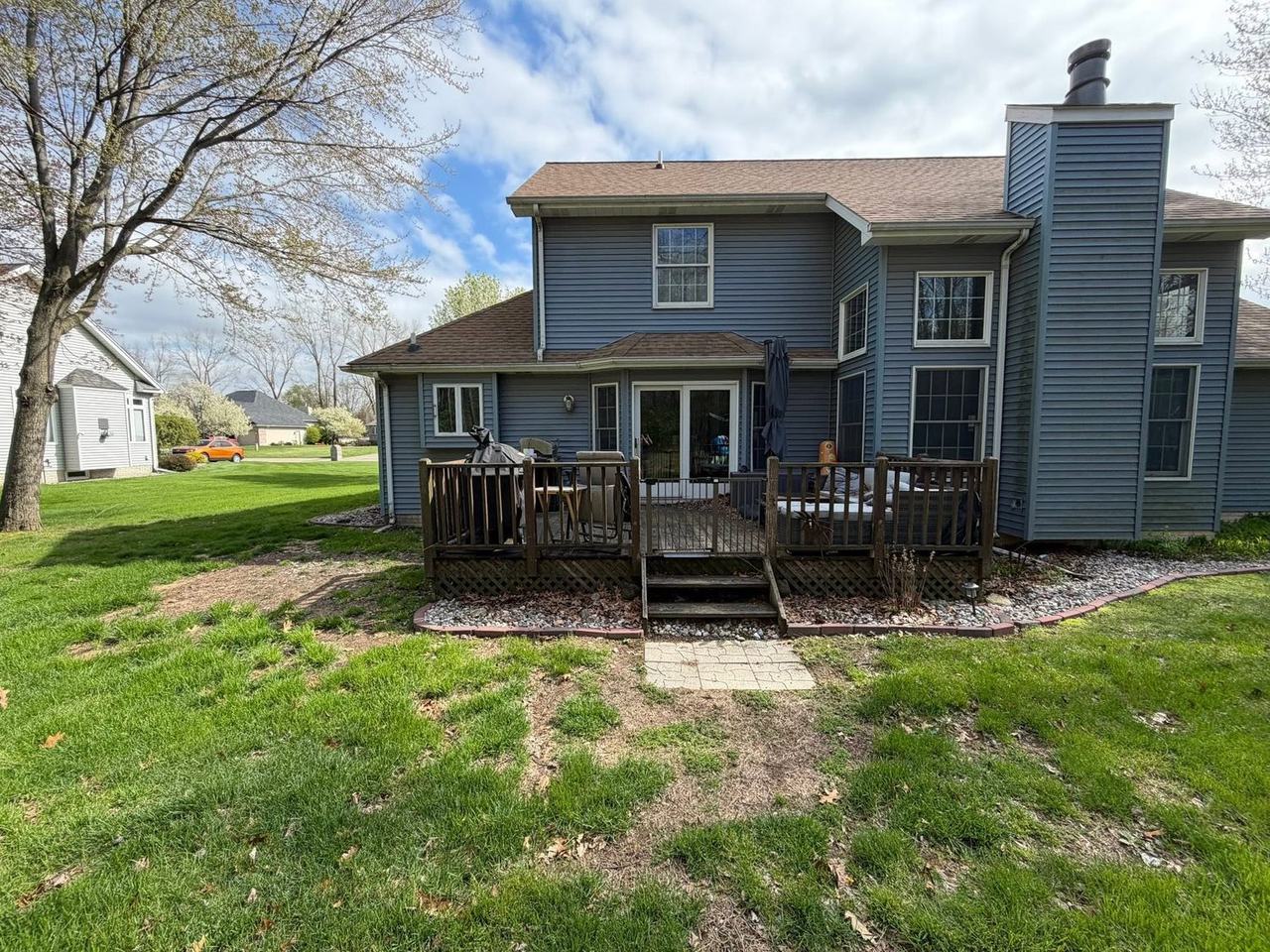 Weathered wooden deck before replacement